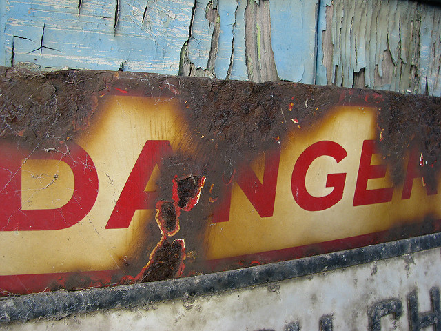 Deteriorated sign warning of danger