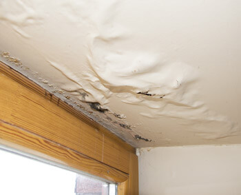 bubbling paint on ceiling from water damage