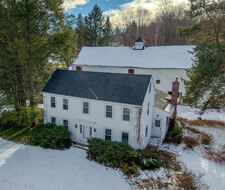 a house with snow around it