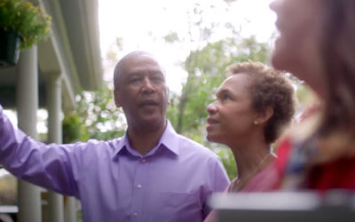 people looking at a house