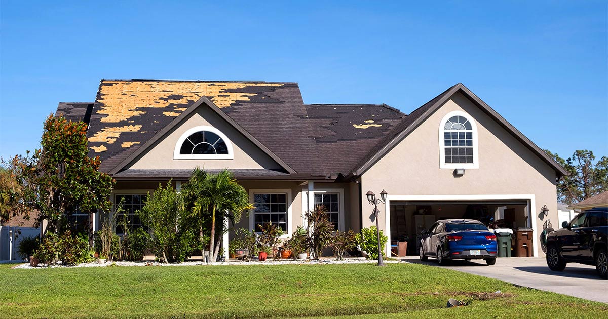 house with roof damage