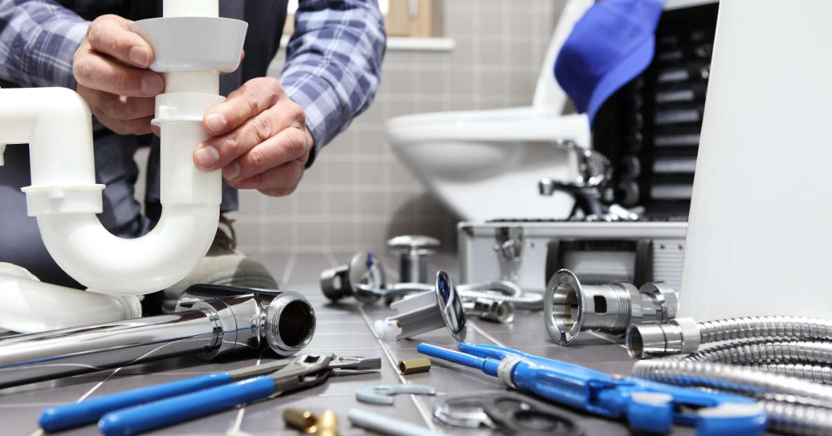 Man Installing Plumbing